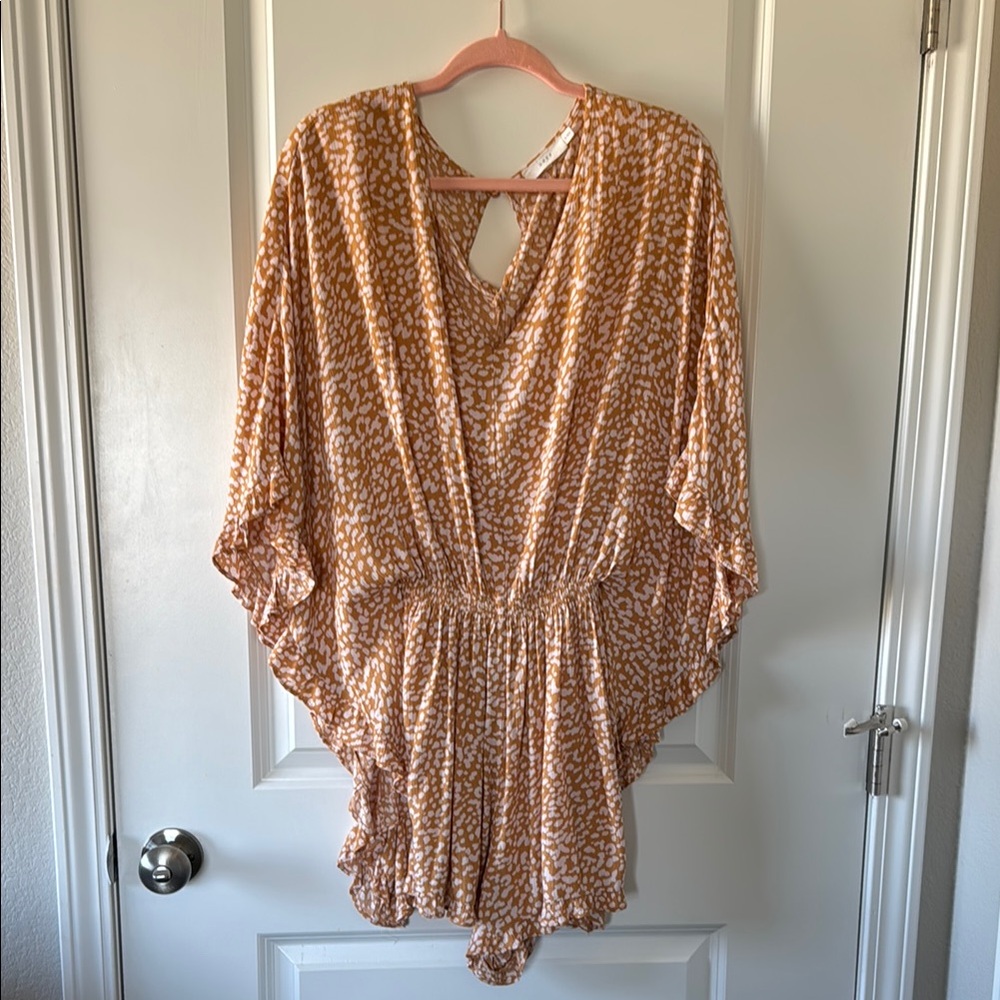 Flowy Orange and White patterned romper